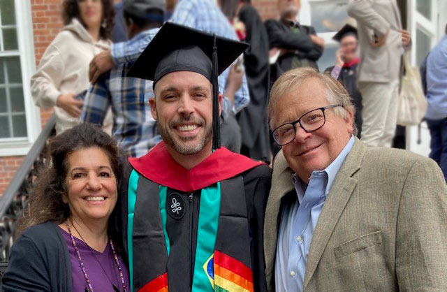 Hosts and student at Commencement