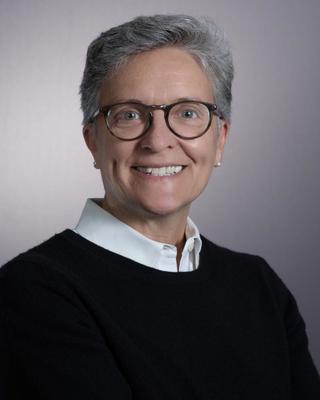 Headshot photo of Martha Gladue