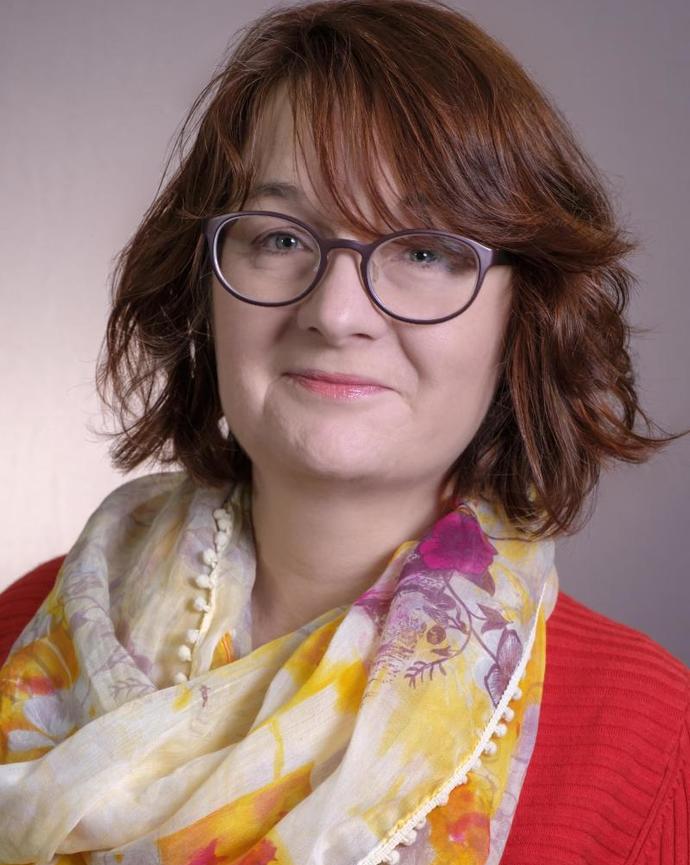 Headshot of Ivana Hrga-Griggs